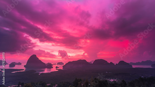 Landscape of sunrise at limestone karsts in Phang-nga bay at sunrise. Unseen place of  Samed Nangshe  or  Samet Nangchee  in Phang Nga province  Thailand.