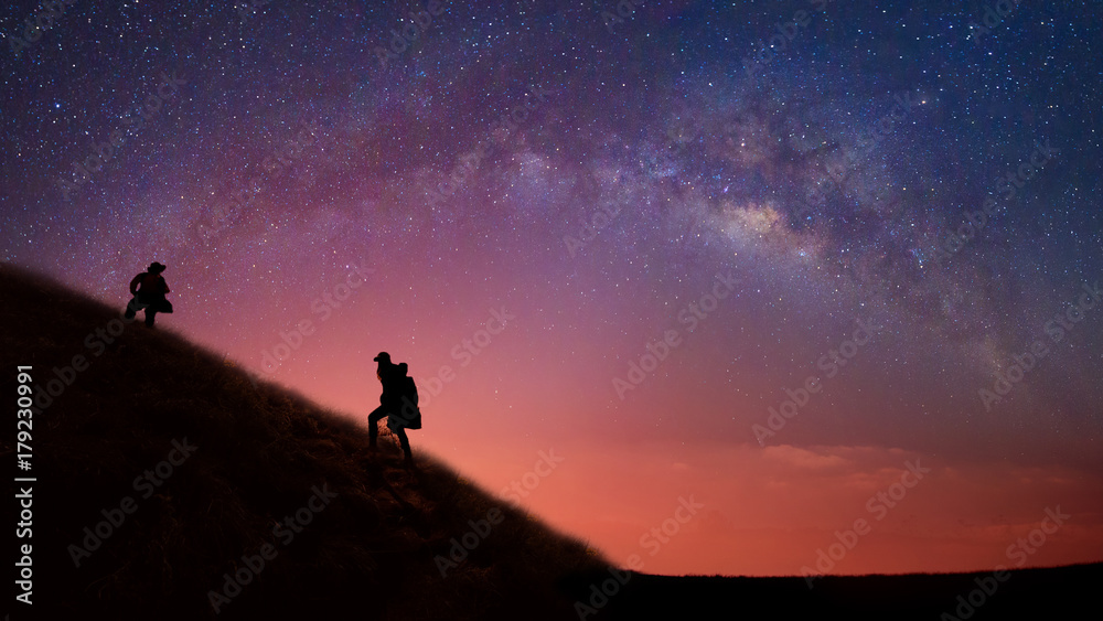 Detail of the milky way with photographers, panoramic view UltraWide 16:9 Resolution