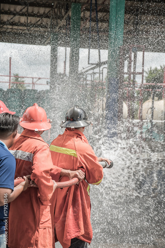 Firefighters rehearse fire fighting plans at LPG storage facilities.