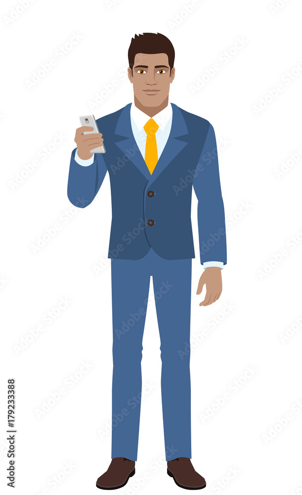 Obraz premium Businessman using mobile phone