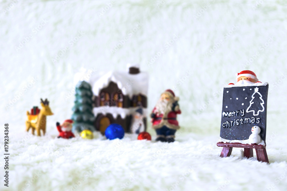 Christmas decoration Holiday with Santa Claus and snowman on snow background and copy space
