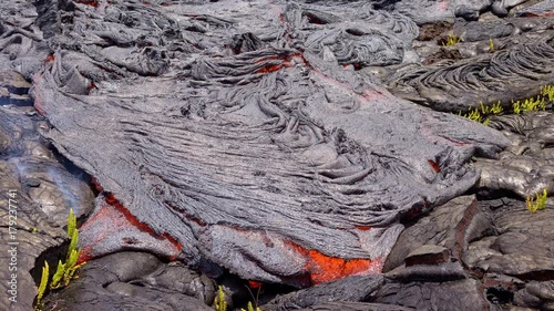 Lava lifts and flows time lapse Day daytime Glowing Hot flow from Kilauea Active Volcano Puu Oo Vent Active Volcano Magma