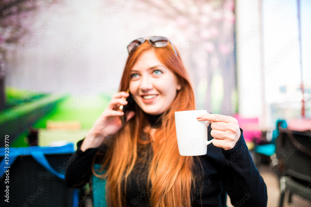 Beautiful girl drinking coffee at the coffee shop Beautiful girl drinking coffee at the coffee shop