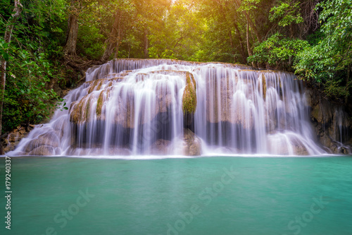Fototapeta Naklejka Na Ścianę i Meble -  Amazing beautiful waterfalls level two in tropical forest at Erawan Waterfall in Erawan National Park, Kanchanaburi Province, Thailand