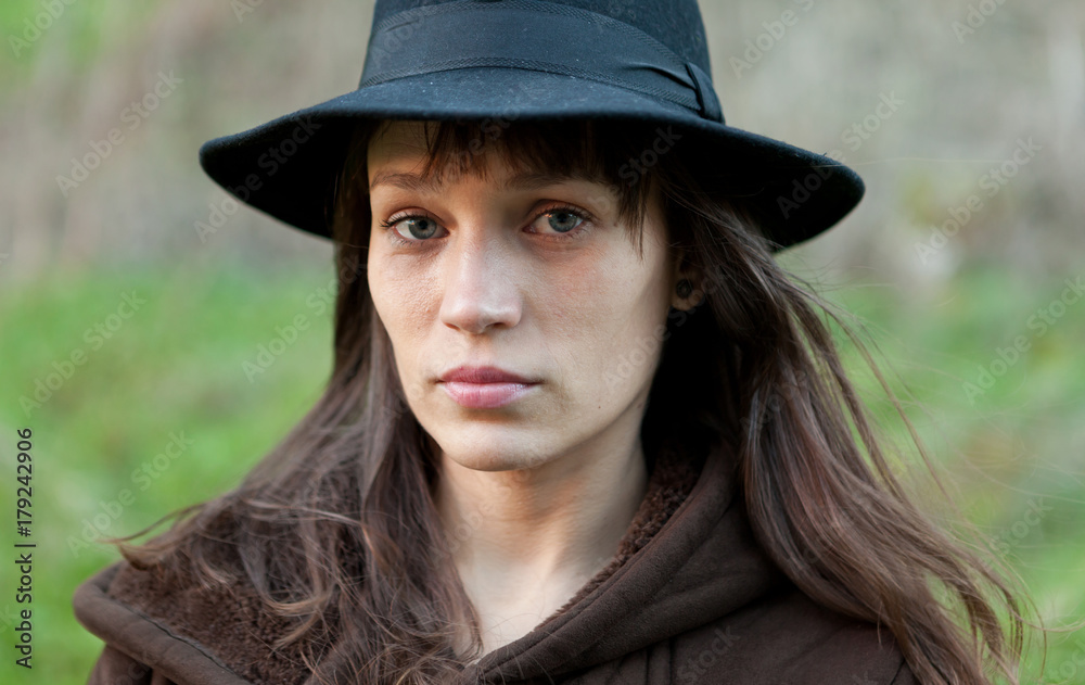 Sad woman with black hat Sad woman with black hat