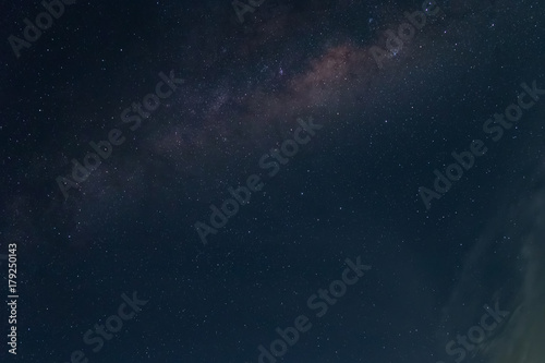 Milky way galaxy with stars and space dust in the universe filled © PRASERT