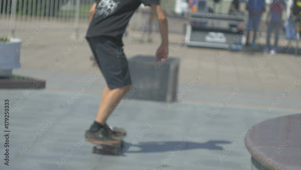Guy in glasses skates on a skateboard and is preparing to jump slow motion Guy in glasses skates on a skateboard and is preparing to jump slow motion