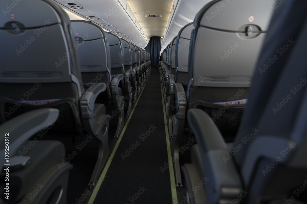 The rows of seats on the plane