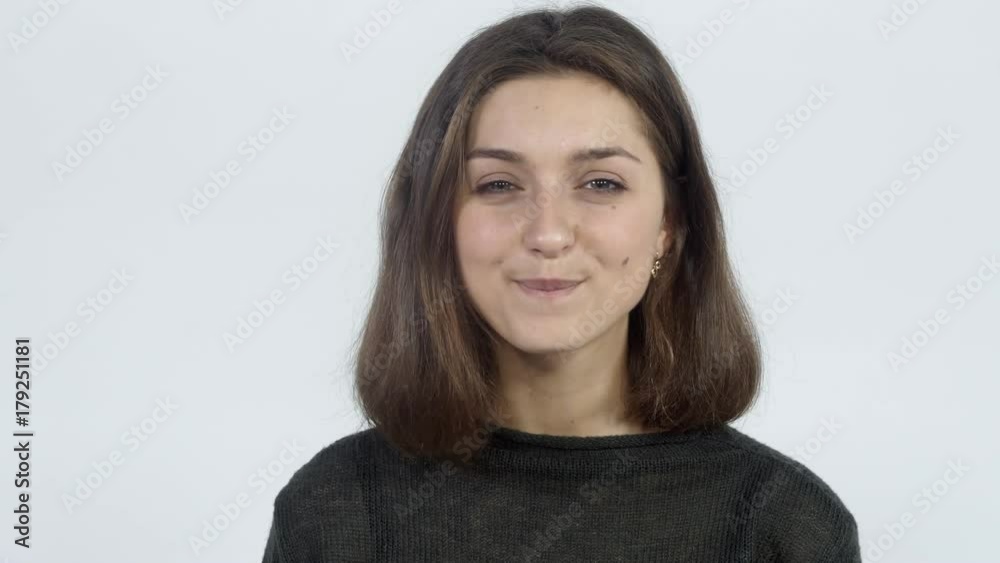 The girl is pointing at you