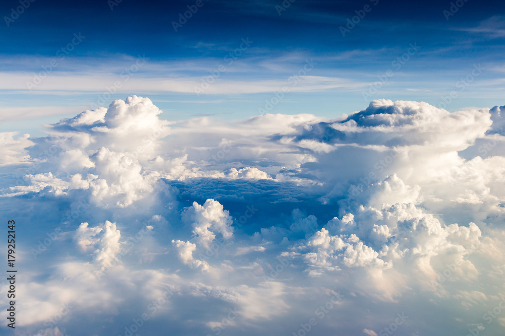 Fototapeta premium blue sky with the clouds from the plane view