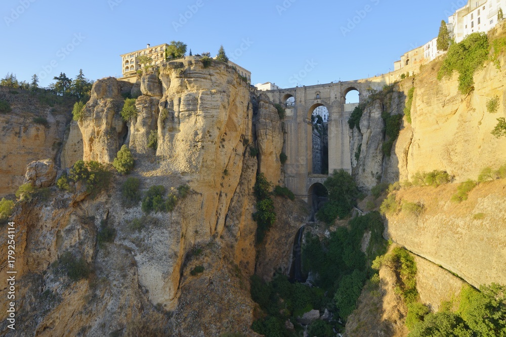 View of the Puente Nuevo and the el tajo gorge in the andalusian iconic place Ronda, Malaga region, Andalusia, Spain.