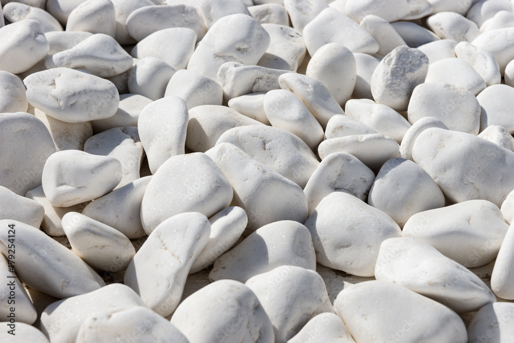 Obraz premium Background and texture of many white round stones