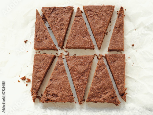 Triangle cake dessert. Preparing chocolate brownie. Decorating chocolate cake as Christmas tree. 
