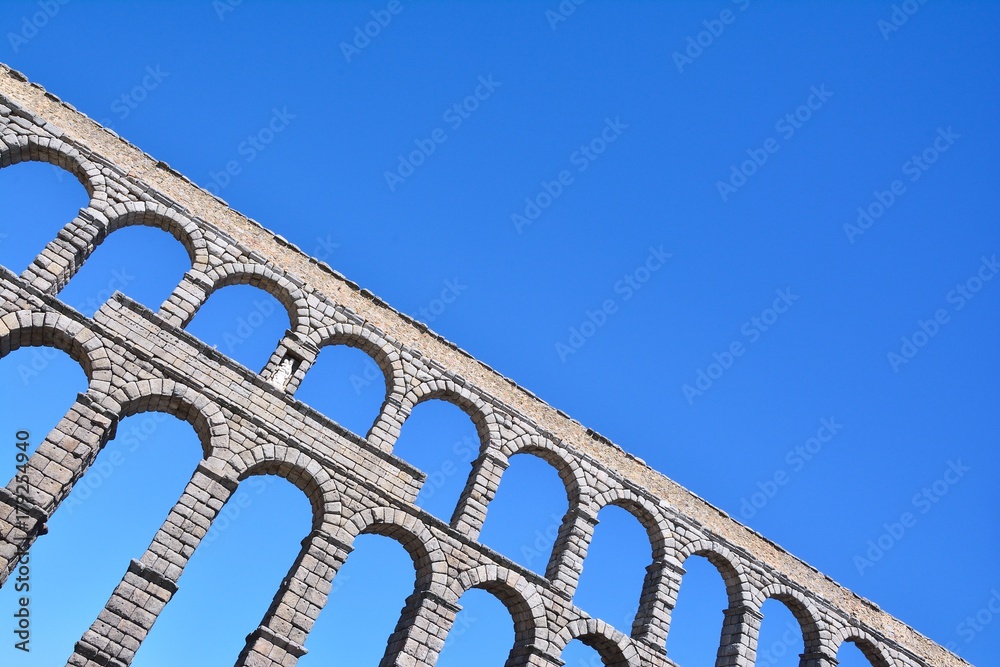 The famous ancient aqueduct in Segovia. The famous ancient aqueduct in Segovia.