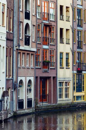 View of beautiful medieval houses in Amsterdam, Netherlands, Europe.