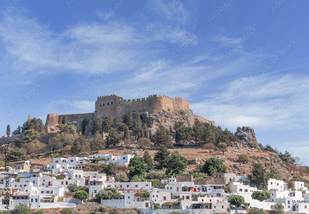 Castle view Acropolis of city Lindos of Rhodes island with big blue clean sky