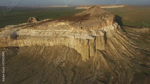 Flying a drone over the mountain Sherkala. Sunset 2 photo