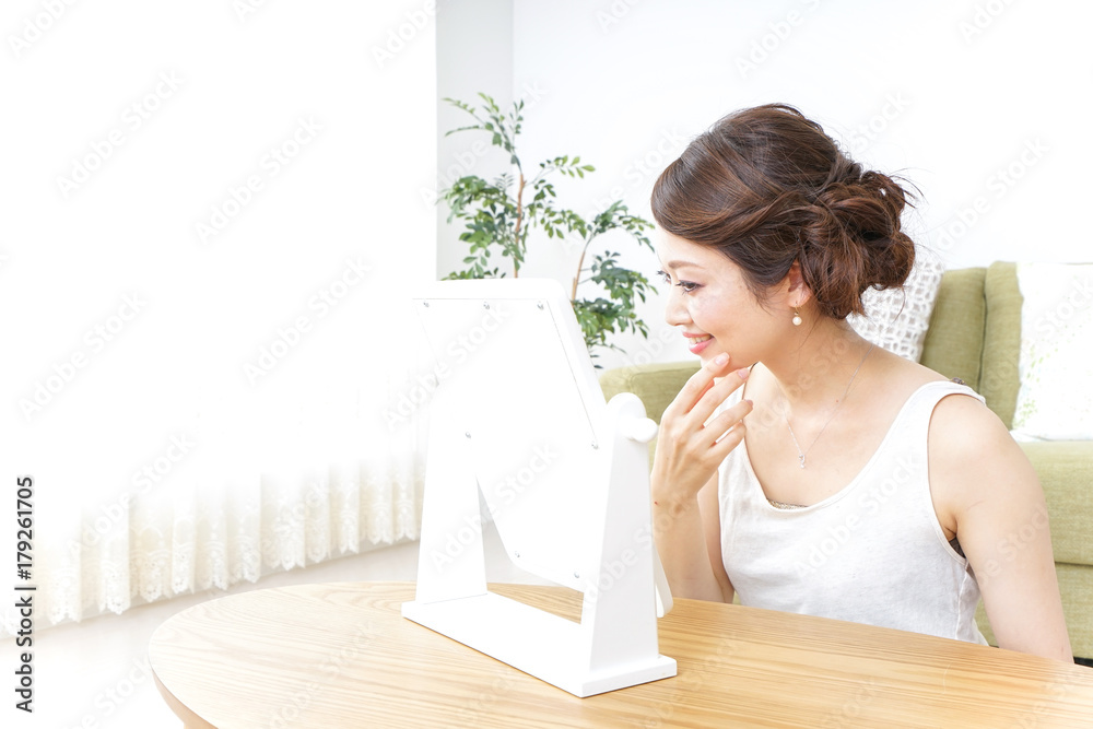 woman making herself up at home woman making herself up at home