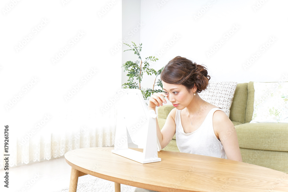 woman making herself up at home woman making herself up at home