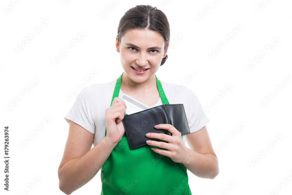 Beautiful employee girl taking out credit card Beautiful employee girl taking out credit card