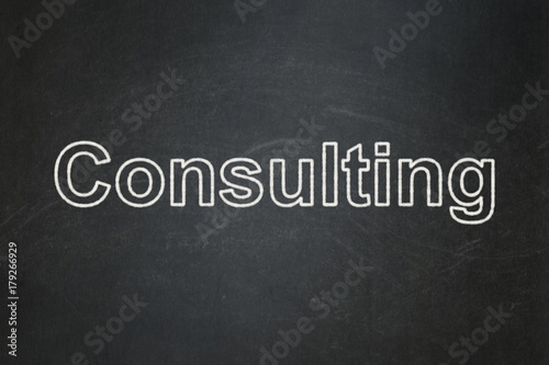 Business concept: text Consulting on Black chalkboard background