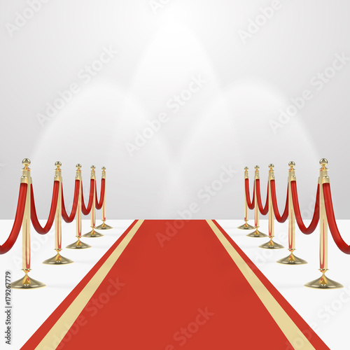 Red carpet with red ropes on golden stanchions