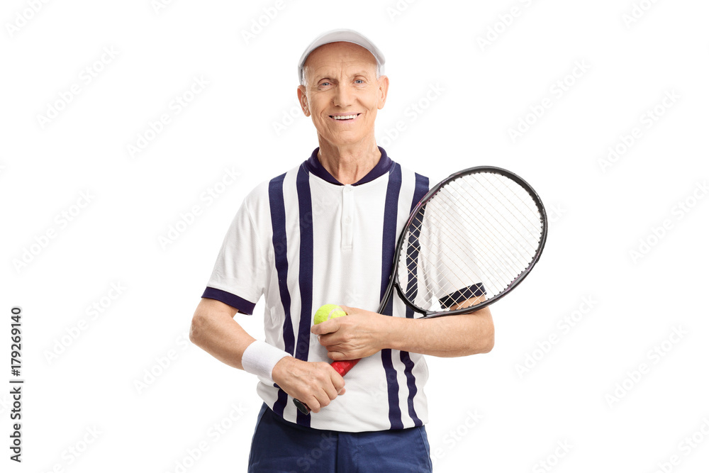 Naklejka premium Senior with a tennis racket and a ball