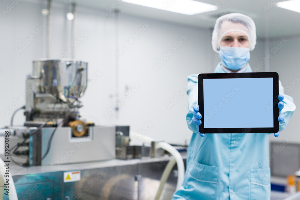 scientist show empty tablet near machines scientist show empty tablet near machines