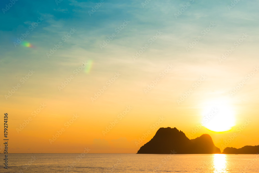 Bright colors at dawn on the beach at sunrise in the Gulf of Thailand. Bright colors at dawn on the beach at sunrise in the Gulf of Thailand.