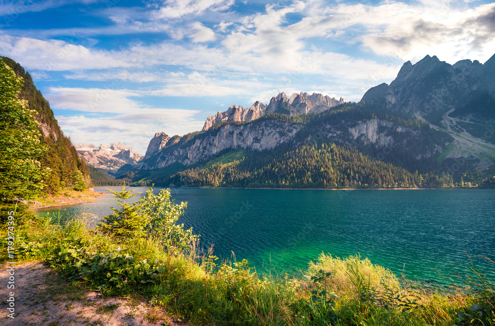 Sunny summer morning on the Gosau Lake (Vorderer Gosausee) with view of Hoher Dachstein and Gosau glacier.