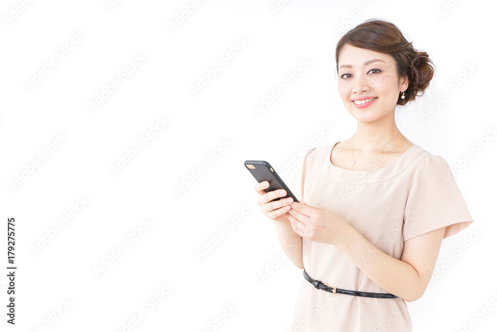 woman in dress using a smartphone woman in dress using a smartphone