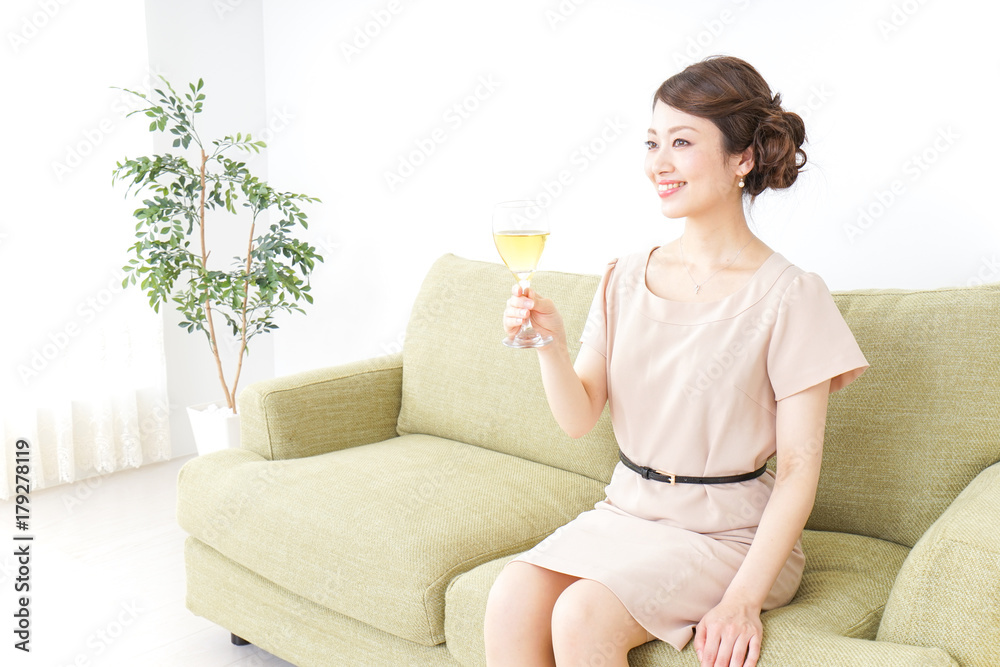 woman drinking alcohol at home 