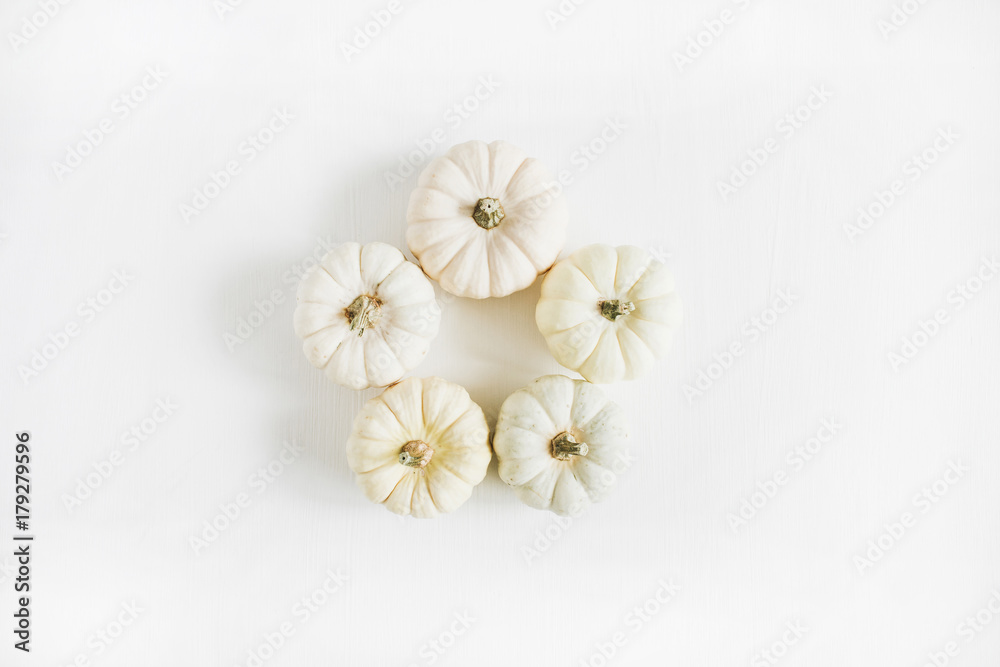 Frame of white pumpkins. Autumn minimal arrangement. Flat lay, top view. Frame of white pumpkins. Autumn minimal arrangement. Flat lay, top view.