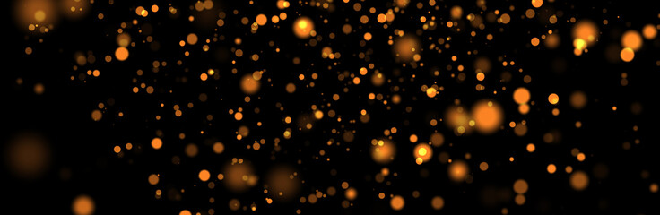 Golden abstract sparkles or glitter lights. Festive gold background. Defocused circles bokeh or particles. Template for design