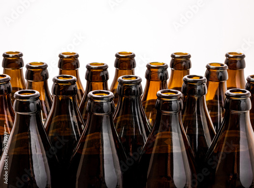 Dozens of empty, brown German beer bottles