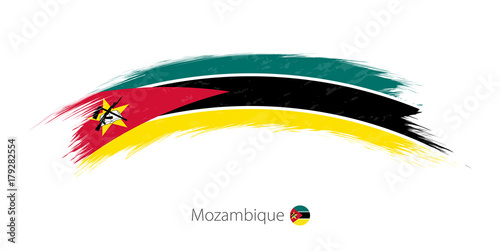 Flag of Mozambique in rounded grunge brush stroke. photo