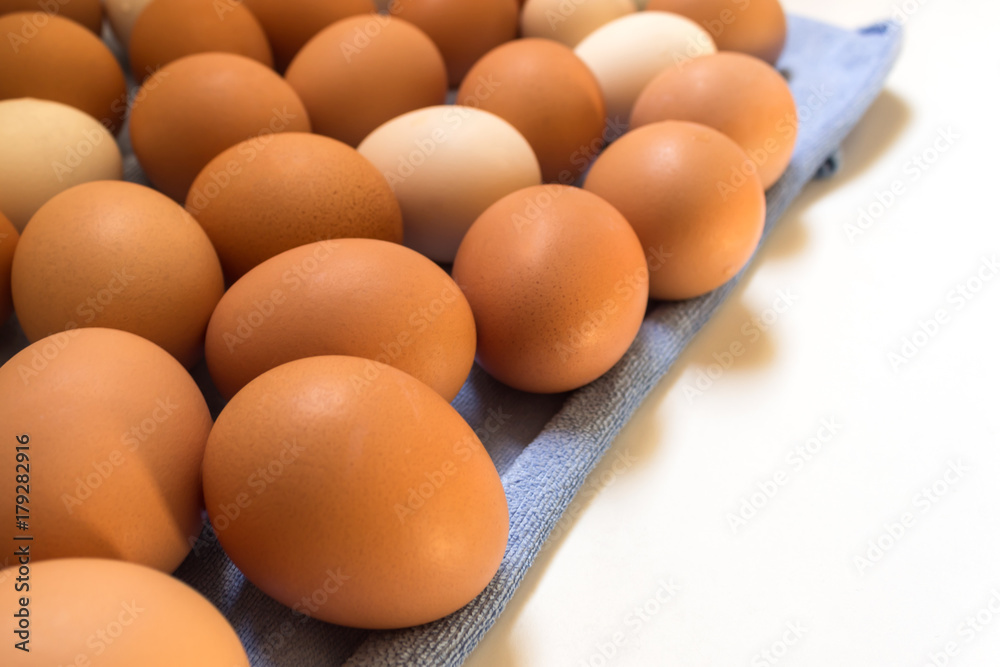 Lots of fresh chicken eggs. Concept of organic products. Farm. Lots of fresh chicken eggs. Concept of organic products. Farm.