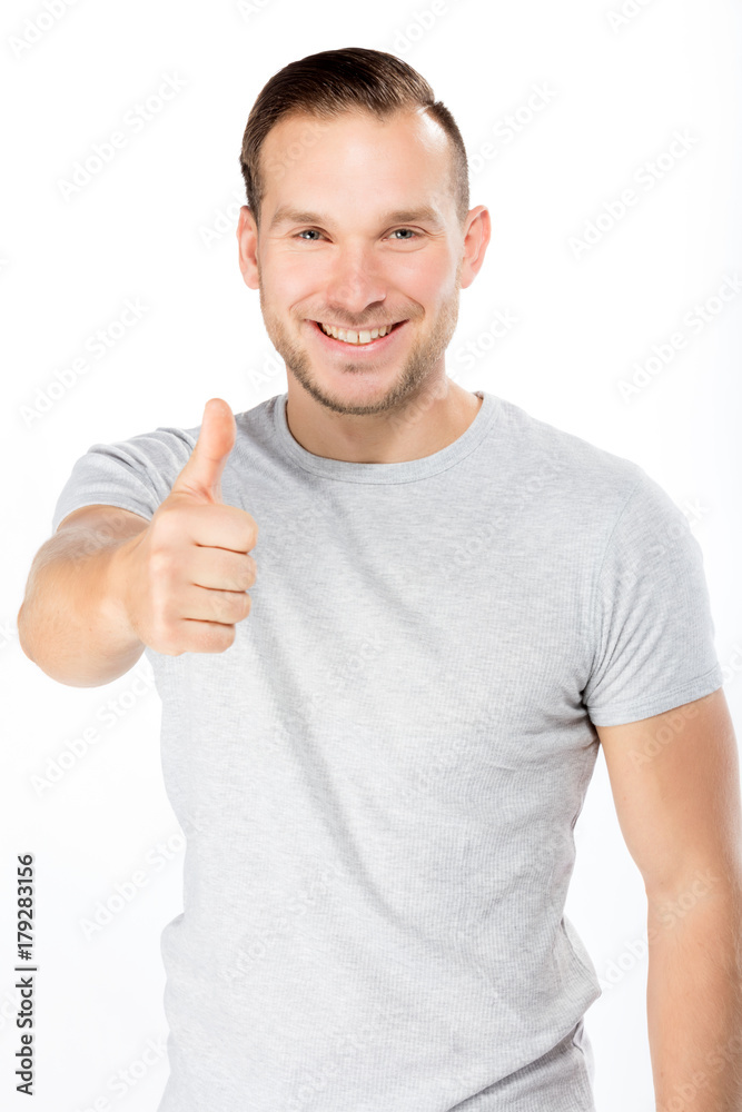 Young attractive man showing OK sign. Young attractive man showing OK sign.