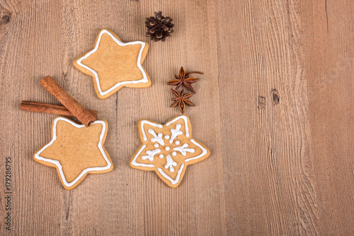 Christmas cookies with decoration / Still life with decorated Christmas cookies on a wooden background 
