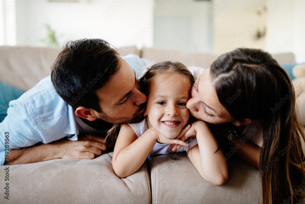 Happy family having fun times at home Happy family having fun times at home
