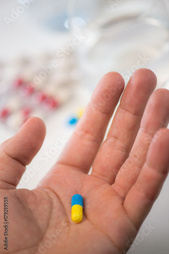 Hand holding remedy Medicine