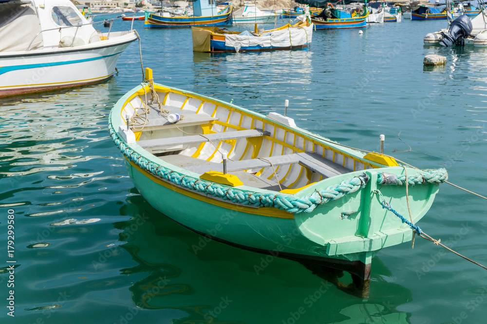 Traditional boats at Marsaxlokk Harbor in Malta Traditional boats at Marsaxlokk Harbor in Malta