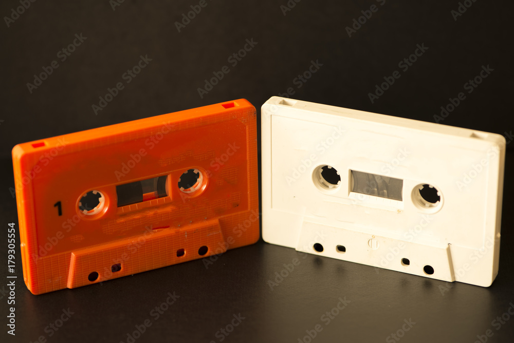 Obraz premium Old cassettes on a background of a black color