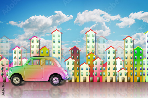Small colored utilitarian car in a big city - concept image with copy space © Francesco Scatena