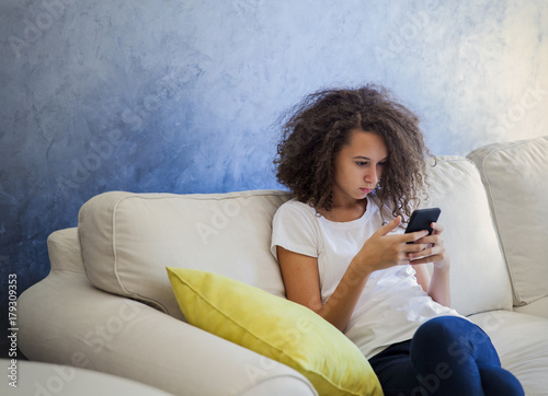 Teen girl with mobile phone