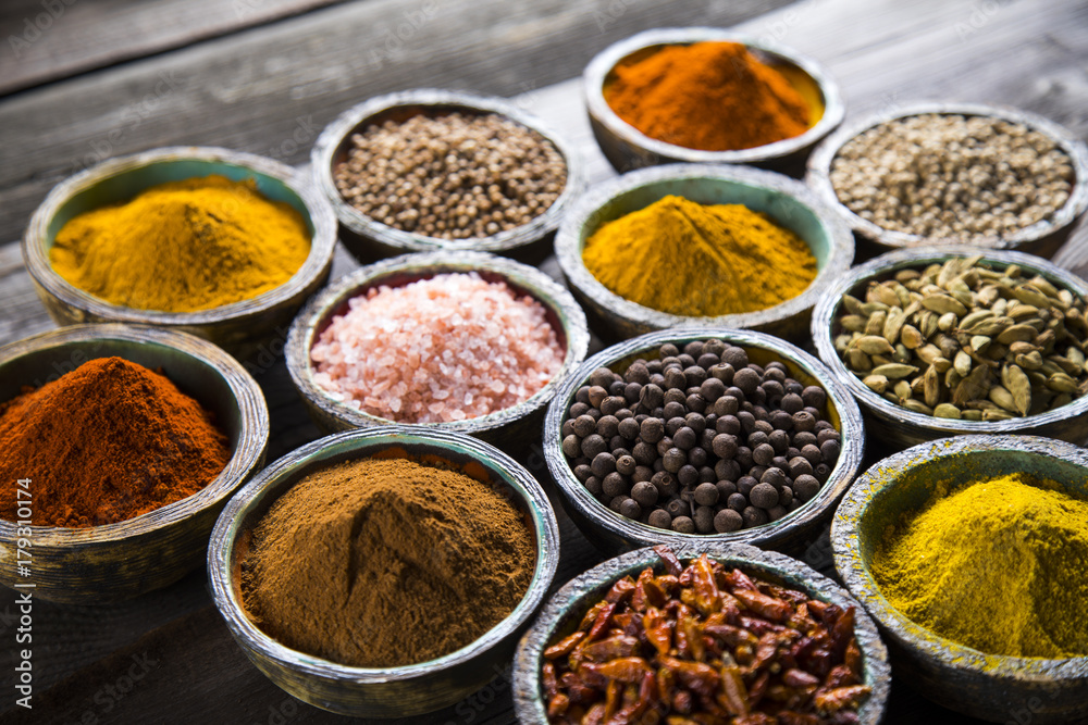 Spices, herbs on a wooden table Spices, herbs on a wooden table