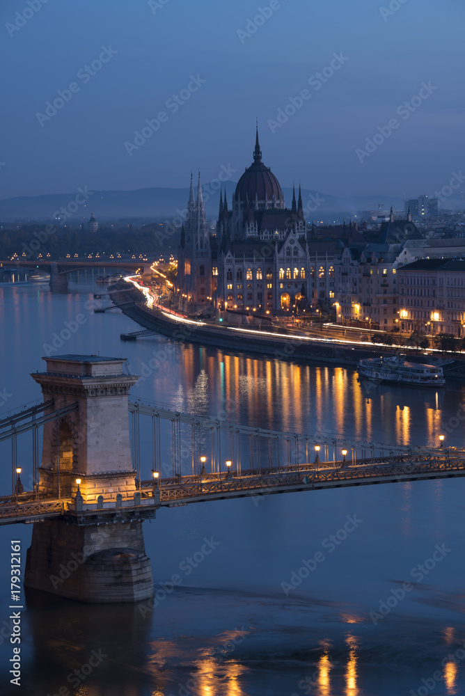 Parliament Building and part of bridge in Budapest and car trails in morining twilight 