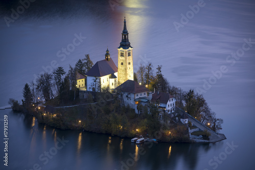 Church on the island of Bled lake in Slovenia in dusk time close up