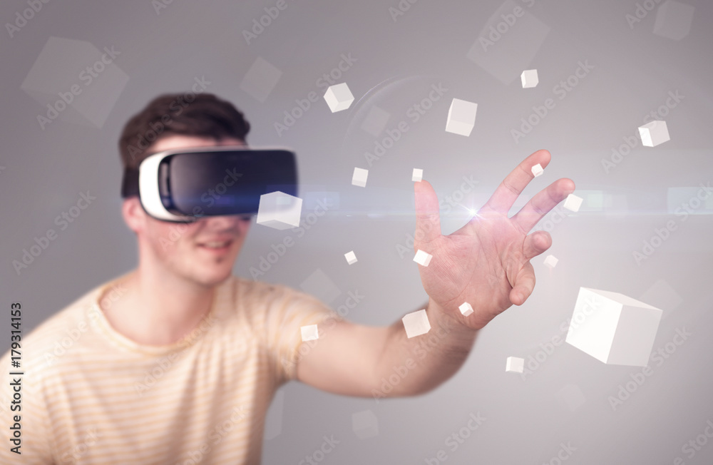 Man wearing virtual reality goggles Man wearing virtual reality goggles