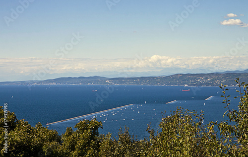 Gulf of Trieste Italy, panoramic summer view of the dams delimiting the harbor